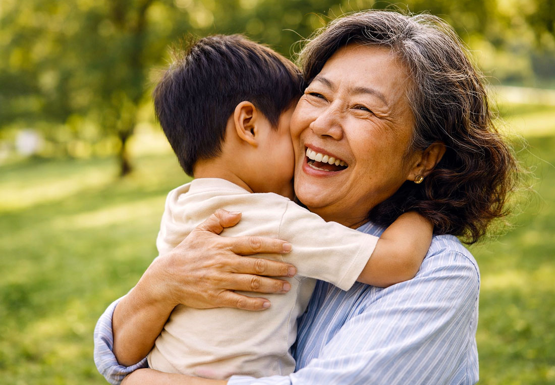 Asian grandmother embracing her grandson after astigmatism treatment at M&M Eye Institute, Prescott, Arizona.